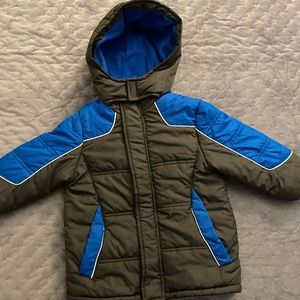 Cozy and stylish hooded Puffer Jacket.